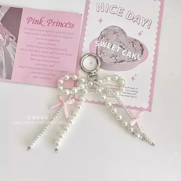 Kawaii Schlüsselanhänger mit Herzanhänger – Süße Perlen-Schleife 2025